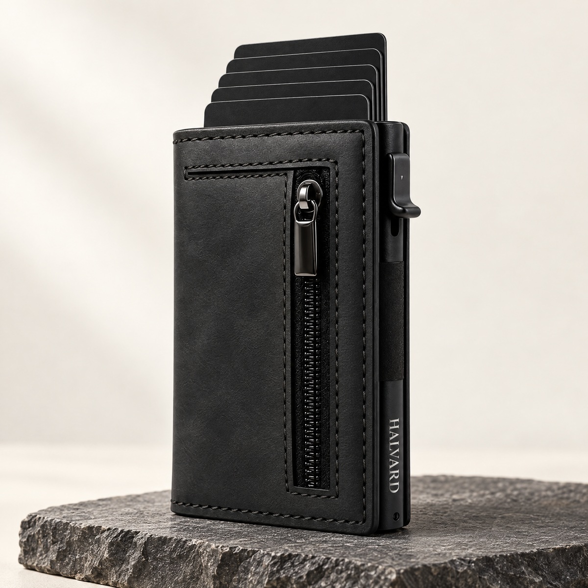 The Halvard Pop-Up Wallet in Midnight Black with cards fanned out